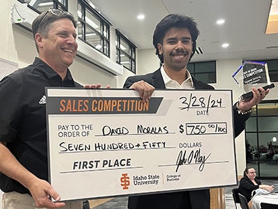 David holding big check for $750 1st place prize