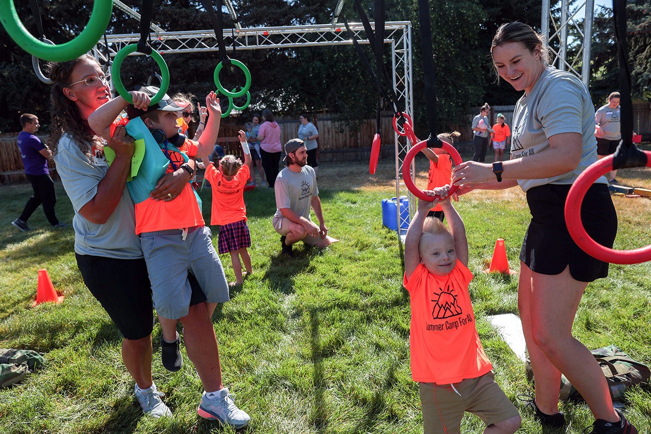 Idaho State occupational therapy students help kids with down syndrome do outdoor activities