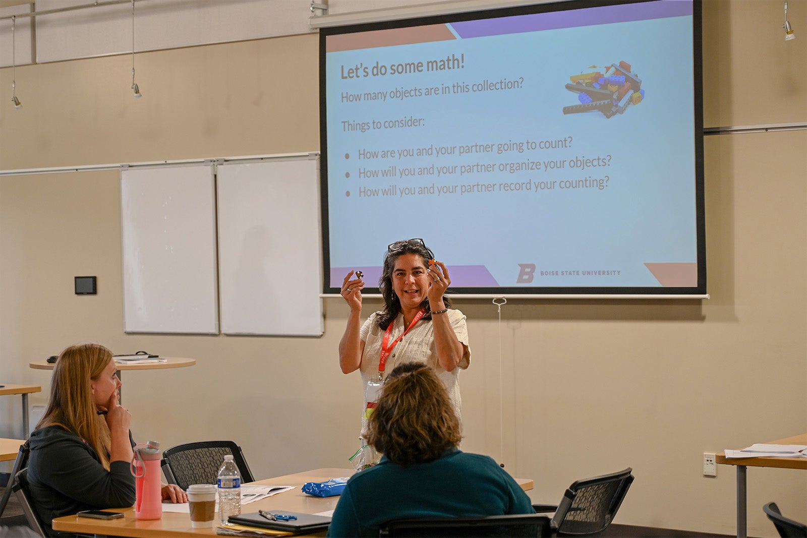 Boise State staff leading Idaho teachers through a presentation on teaching counting to young students.