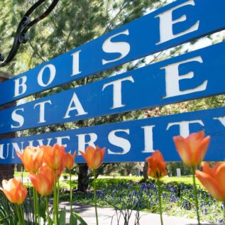 Spring flowers and a Boise State University sign