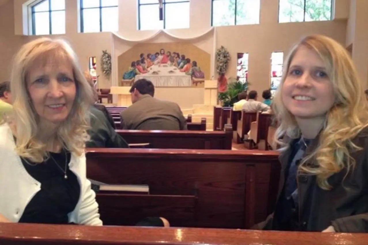 Two person pose in a church pew