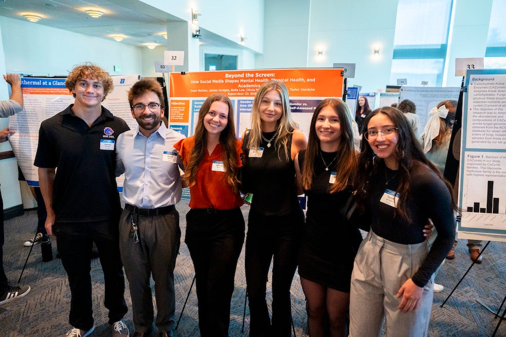 Students pose at a conference