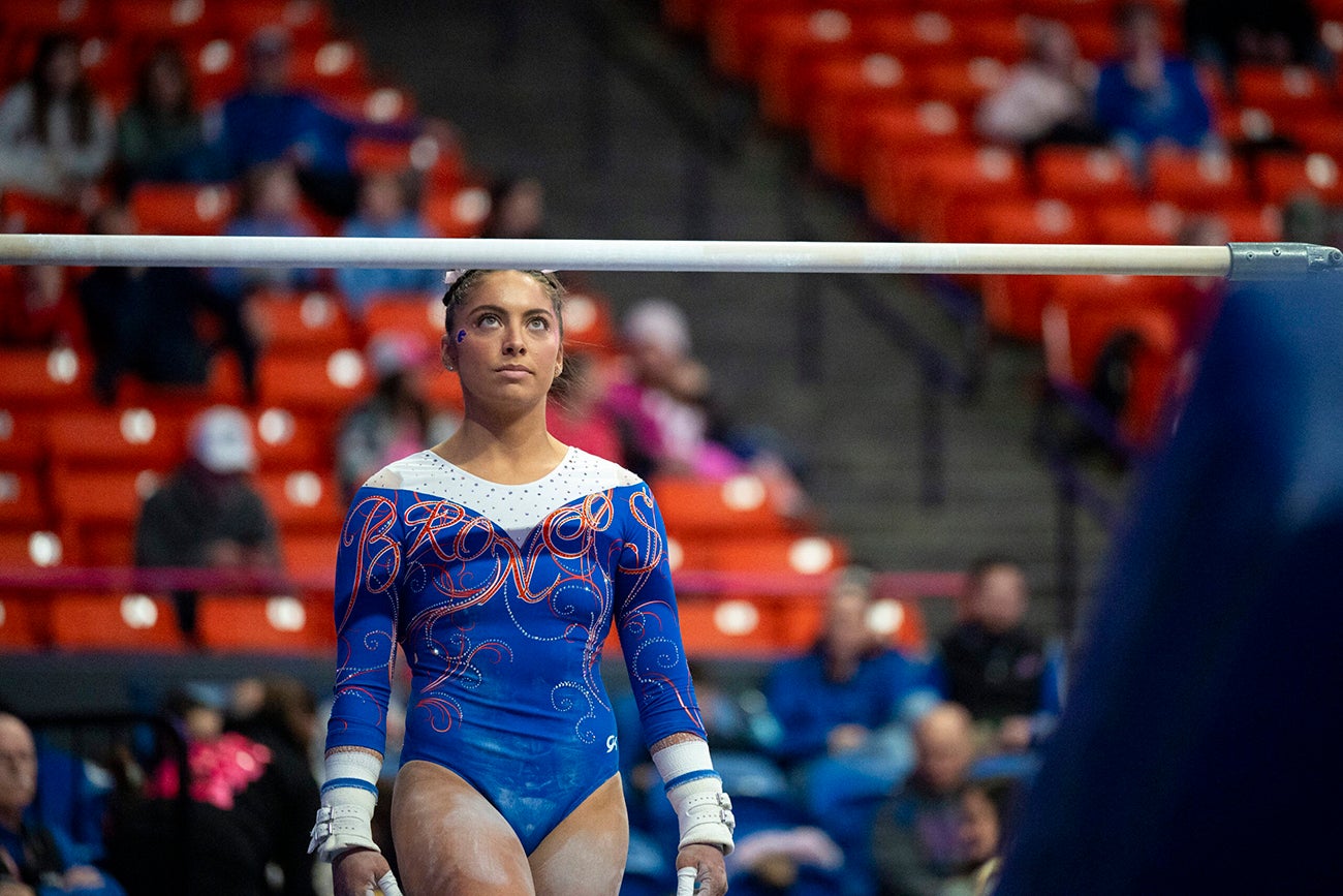 Emily Lopez about to start her uneven bars performance.