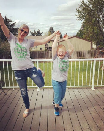 Suzanna Johnson posing with her son 