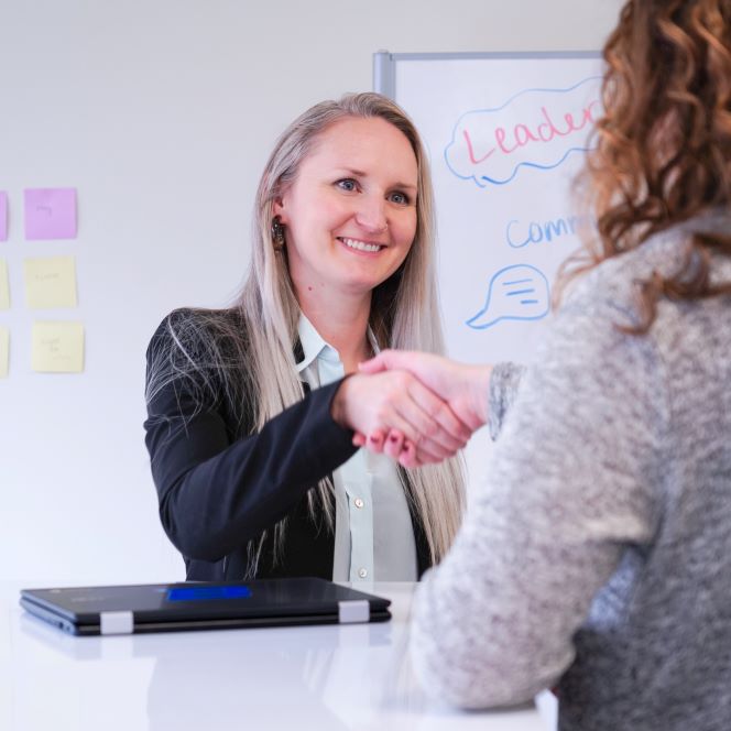 Two people shaking hands