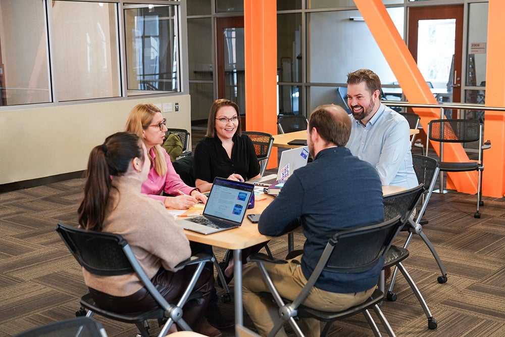 study group sits at table