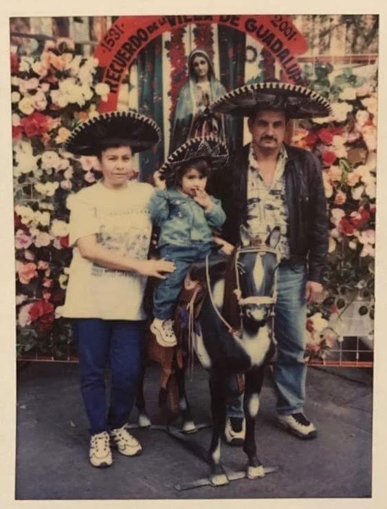 Maria Barajas in her infancy with her parents