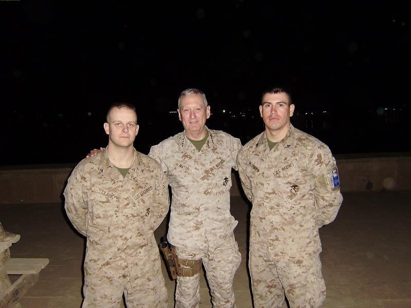 Three marines posing for a photo