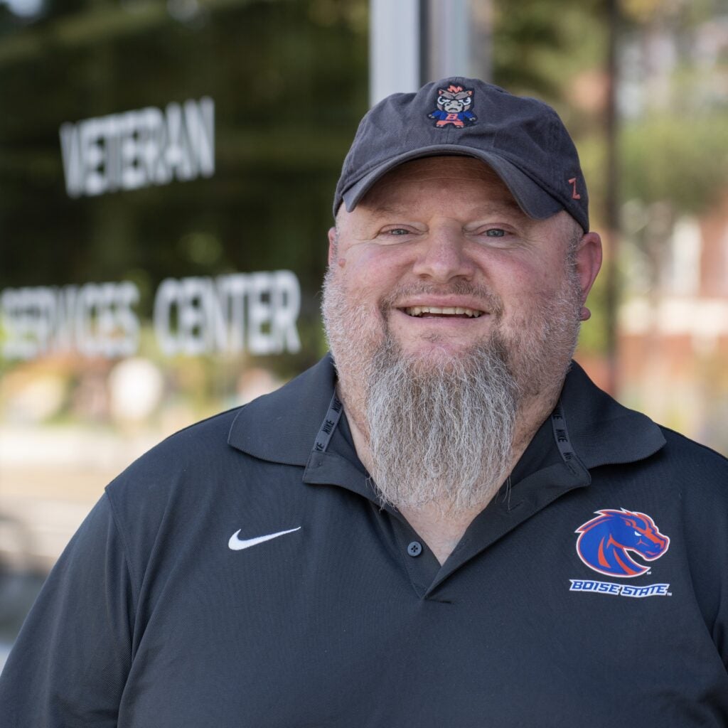 Richard Renz stands in front of the Veteran Services Center on the Boise State campus