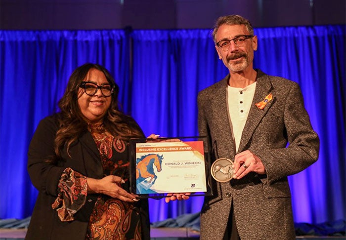 Don Winiecki with his Inclusive Excellence Award and Medal