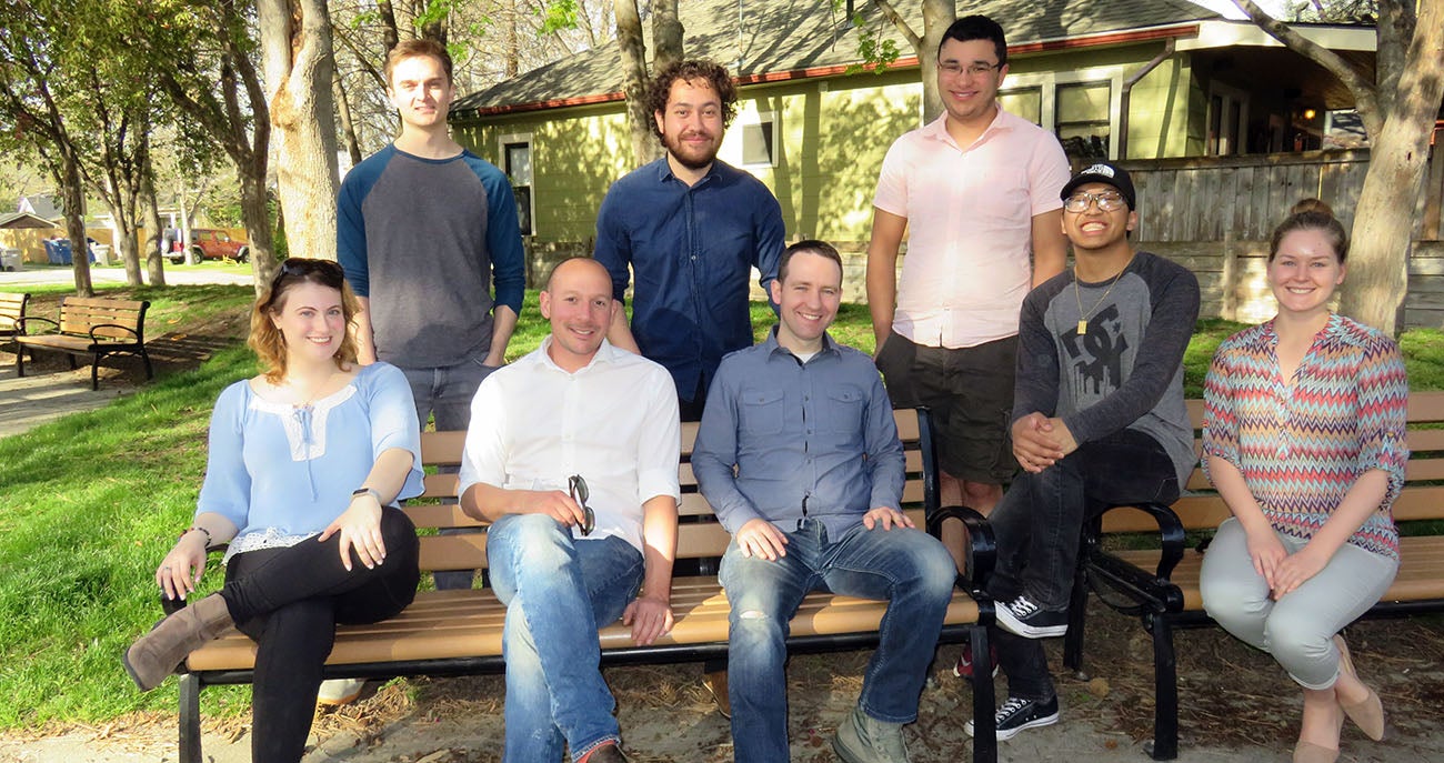 research group sitting outside