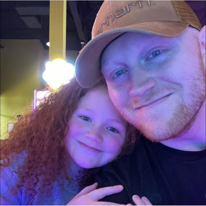 Myles with his daughter