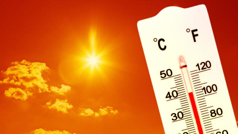 red mercury thermometer with a high reading