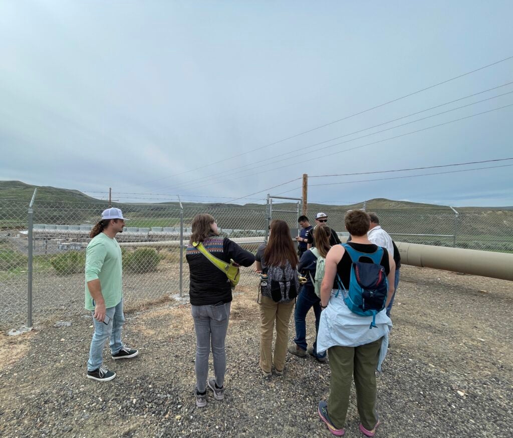 Group of students assembled for a guided tour at Neal Hot Springs.