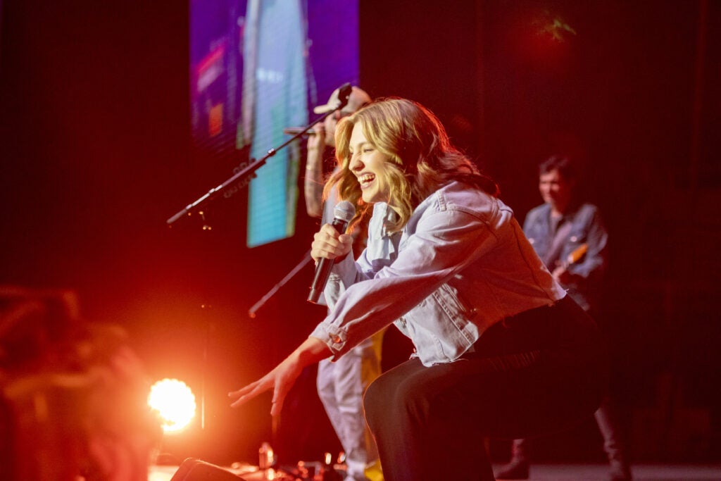 Photo of Morgan Kelly singing on stage
