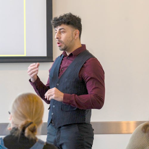 Adrian Rodriguez presents his thesis at the Three Minute Thesis Competition.