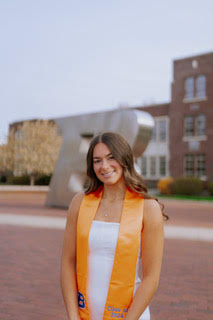 Gretchen Kirk with graduation stole