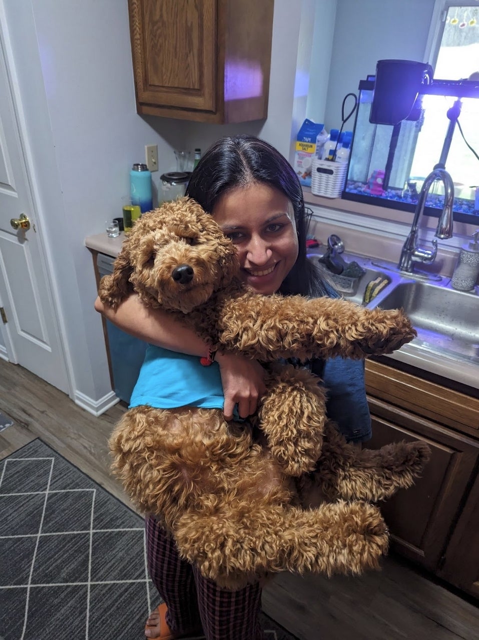 Assistant Professor Kruti Chaliawala and her dog.