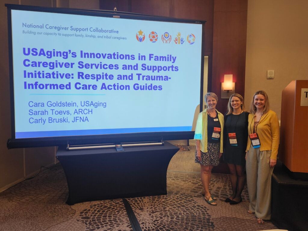 Toevs (left) presents at the National Respite Conference. 