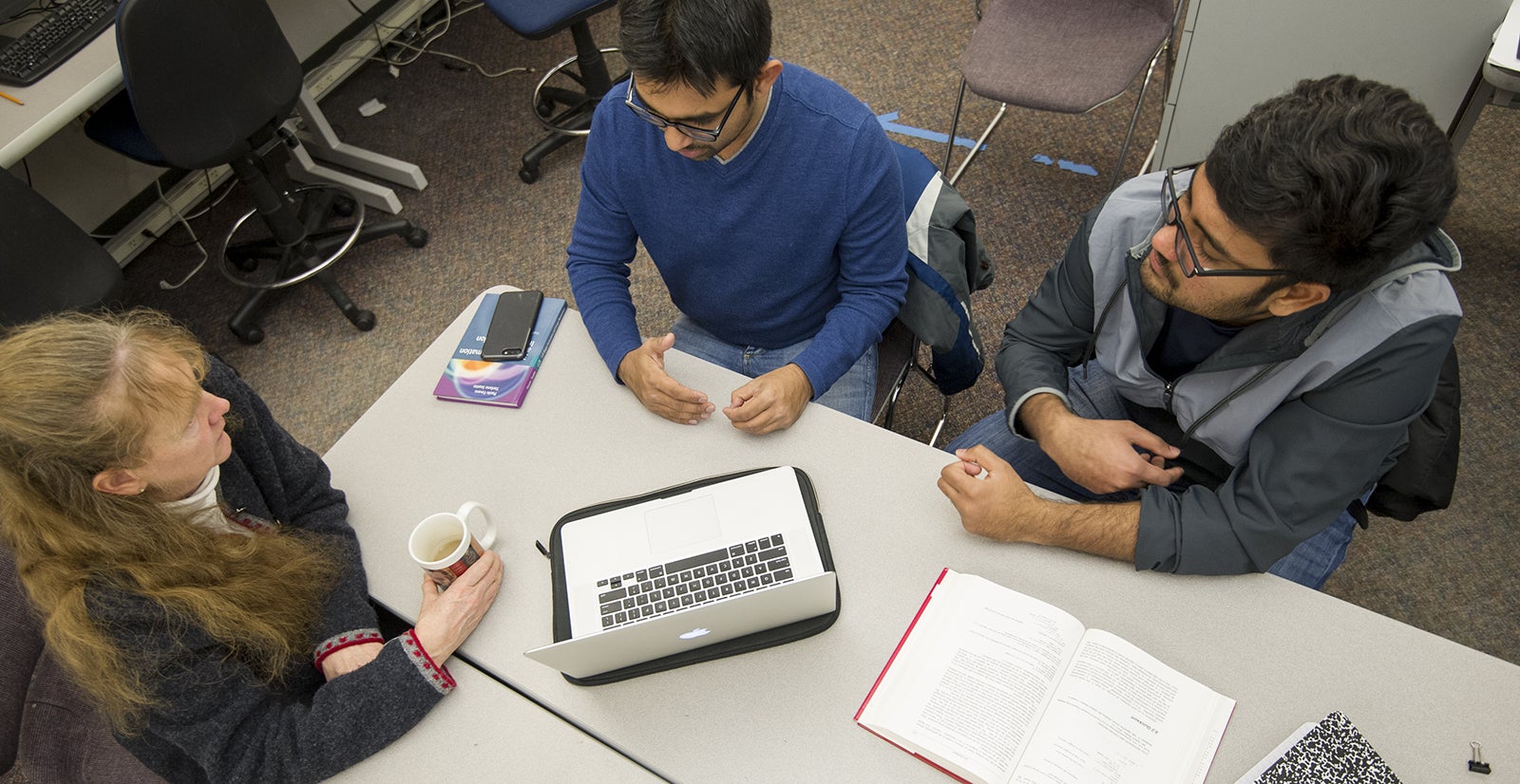 students around computer
