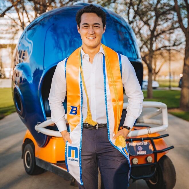 Kenny Huston in front of football golf cart
