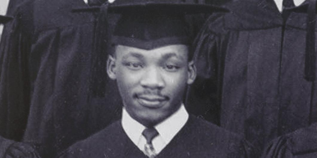 King pictured in graduation regalia.