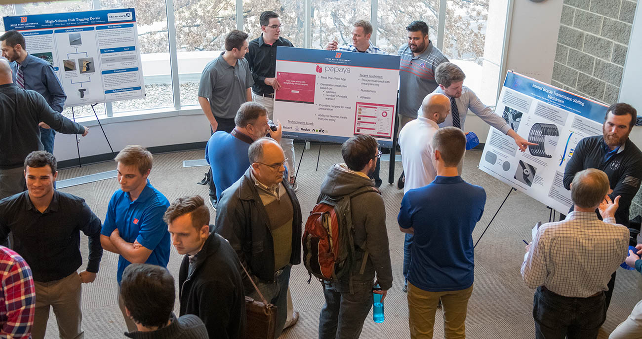 Students presenting research at campus event