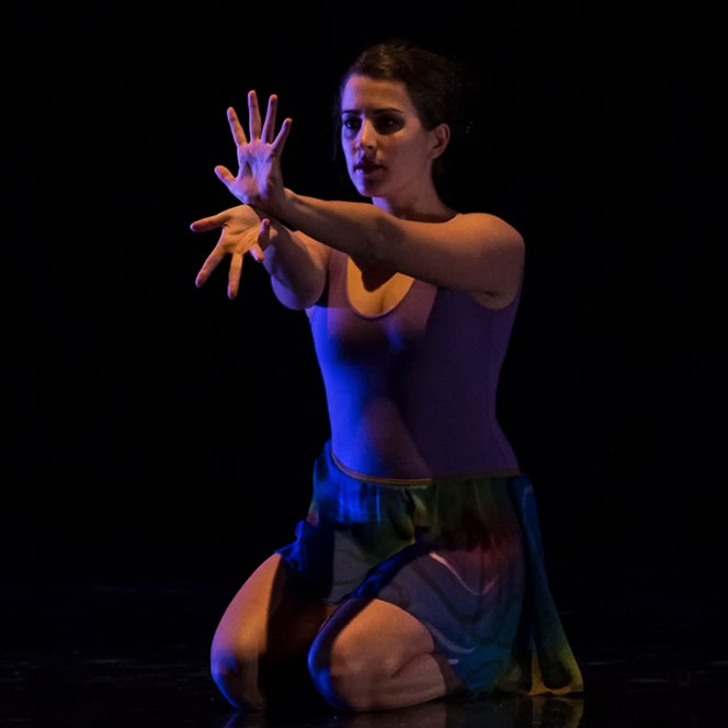 Dancer on stage mid-performance