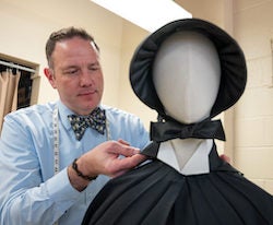 Darrin Pufall Purdy working on theater costume