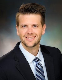 Brett Adkins' headshot