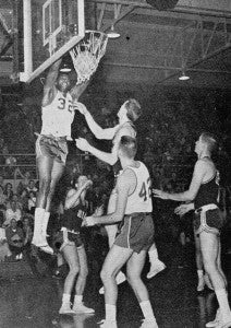 Johnson leaps to the rim to dunk a basketball