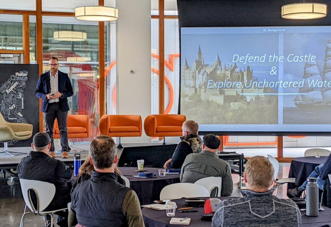 Mike Rubin, with Boise Cascade, addresses the crowd at the first Housing Innovation Hub summit.