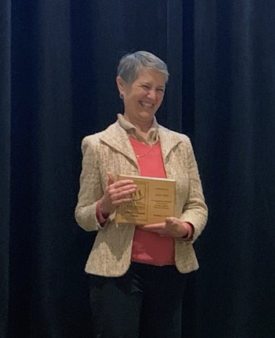 Toevs receiving award