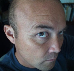 Bill Carman looking up towards camera Bill Carman